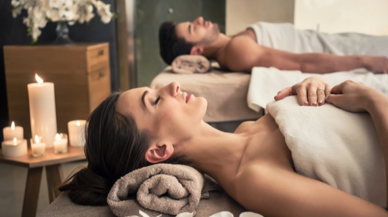 a couple partaking in massage and self-care