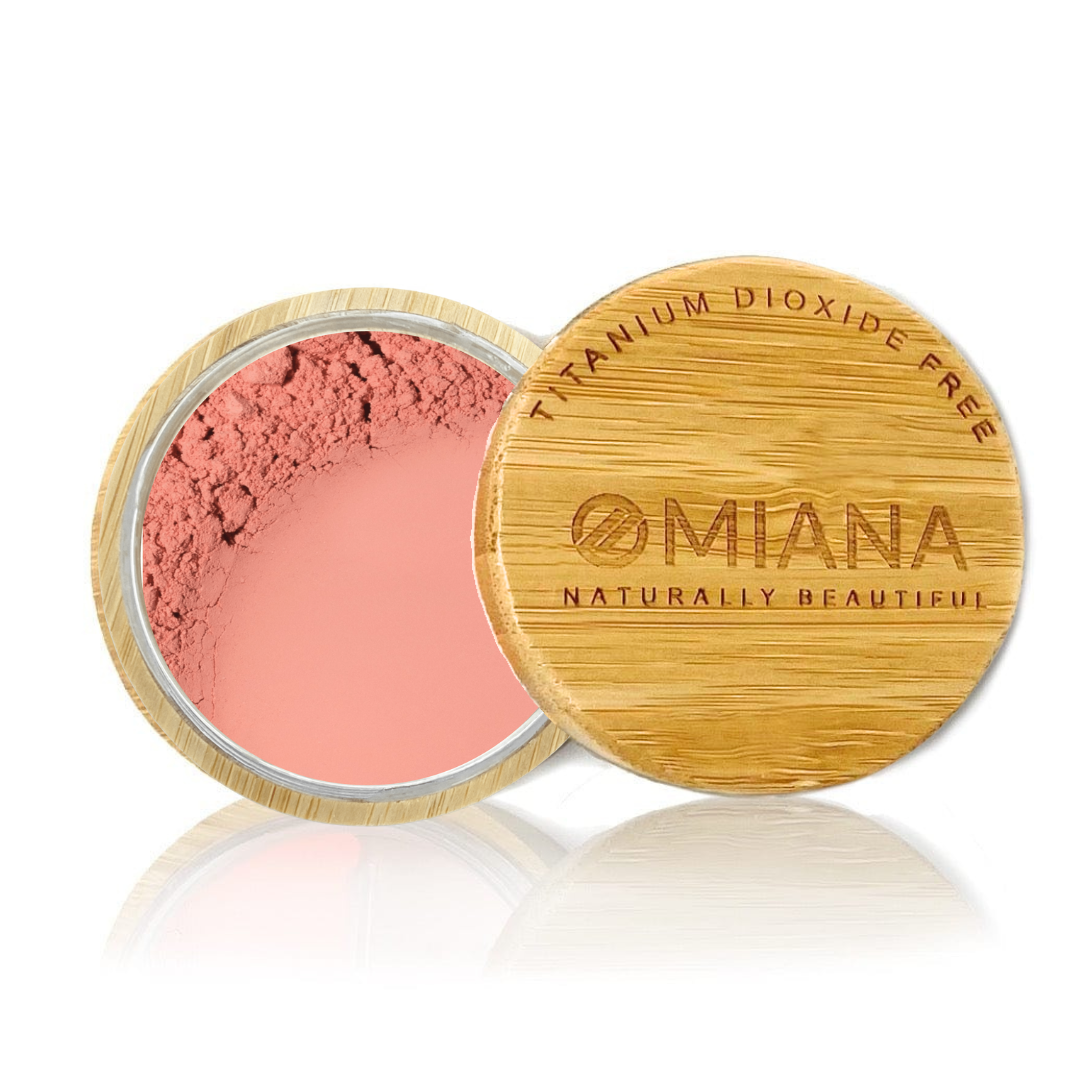 Omiana Loose Powder Mineral Blush Makeup in a bamboo container on a white background