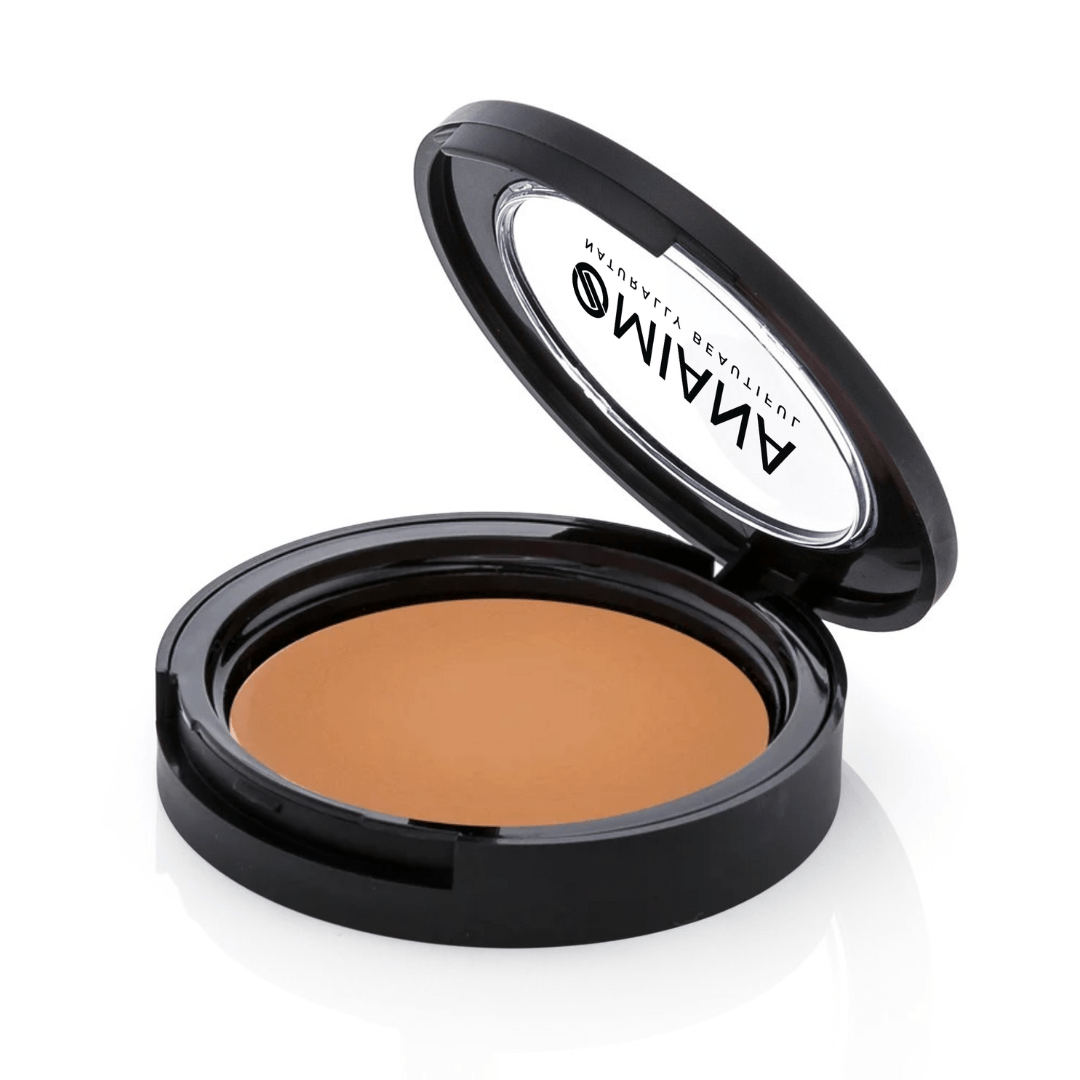 Mineral makeup clean ingredient Omiana open compact powder case with tan  powder and brand logo on a white background